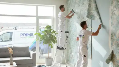 Professional wallpaper removal by house painters in Greensboro, NC preparing walls for fresh paint